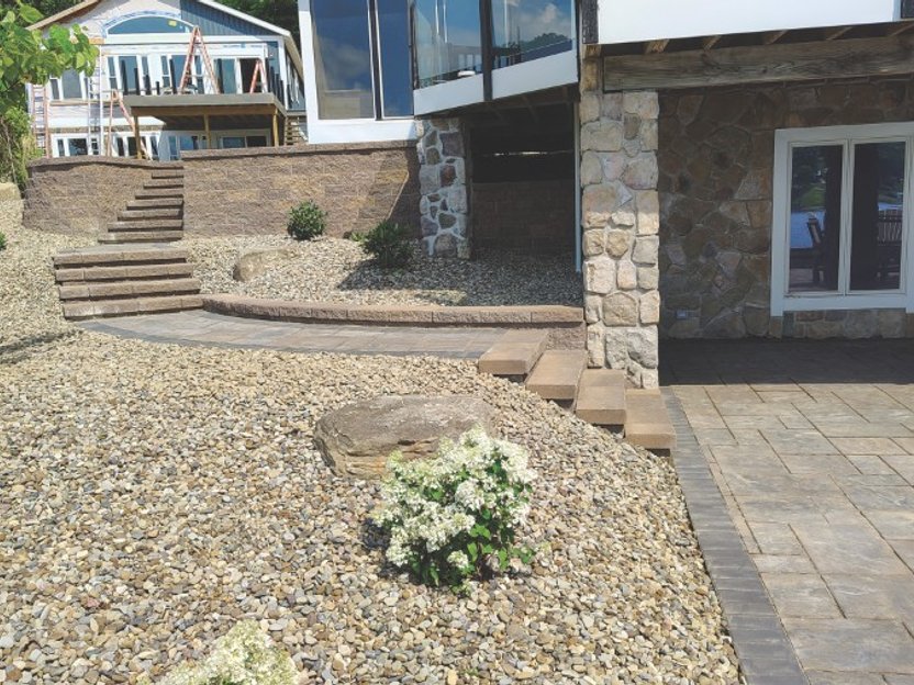 Decorative stone wall and landscape lighting in Wooster Ohio