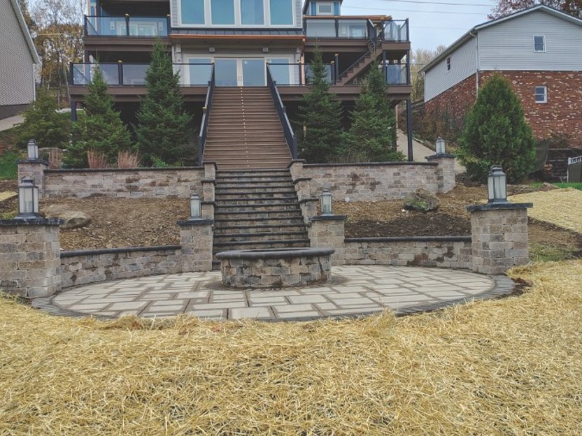 Outdoor living space with paver patio and retaining wall in Cleveland Ohio